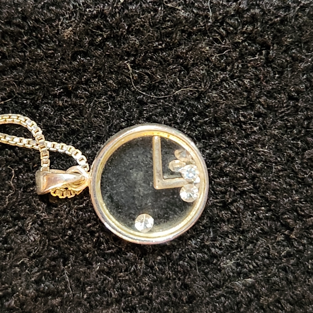 Elegant Gold and Silver Pendant Necklace